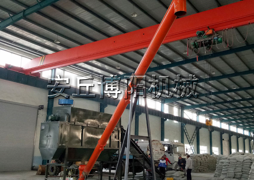 50kg水泥自動破袋機的工業(yè)原理是什么？